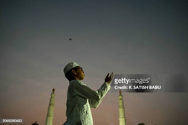 Muslim devotee offers prayers at a mosque ahead of the Islamic holy fasting month of Ramadan in Chennai on March 11, 2024.