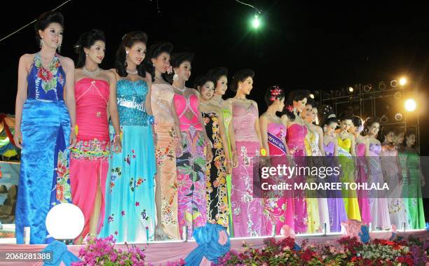 Models show Batik outfits during "We Love Bangnara" fashion show festival in thailand's restive southern Narathiwat province on July 3, 2008. Batik...