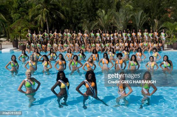 Contestants gather poolside at Diamond Bay Resort and Golf to pose in their BSC Swimwear on July 2, 2008. The live competition of the 57th annual...