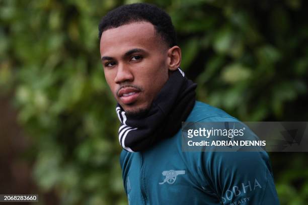 Arsenal's Brazilian midfielder Gabriel Martinelli arrives before a training session on the eve of the UEFA Champions League round of 16 second leg...