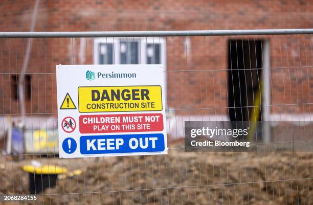 Health and safety sign at the perimeter of a Persimmon Plc residential property construction site in Braintree, UK, on Monday, March 11, 2024....