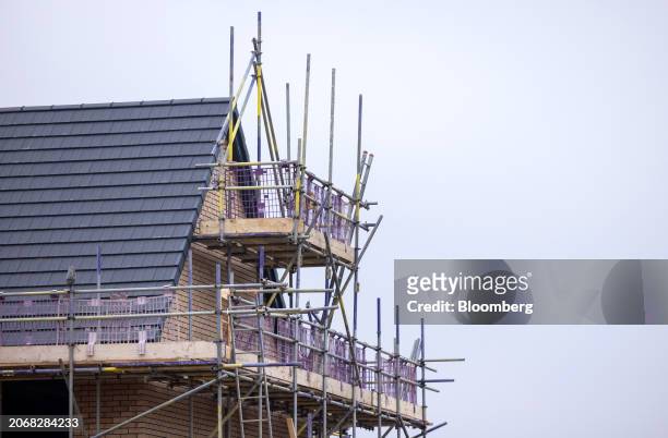 Scaffolding outside a new home being built at a Persimmon Plc residential property construction site in Braintree, UK, on Monday, March 11, 2024....