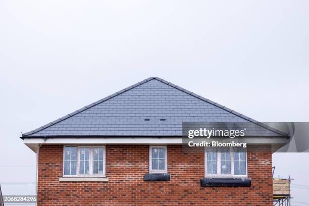 The roof of a newly built house at a Persimmon Plc construction site in Braintree, UK, on Monday, March 11, 2024. Persimmon are due report their 2023...