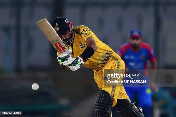 Peshawar's Zalmi Babar Azam plays a shot during the Pakistan Super League Twenty20 cricket match between Karachi Kings and Peshawar Zalmi's at the...