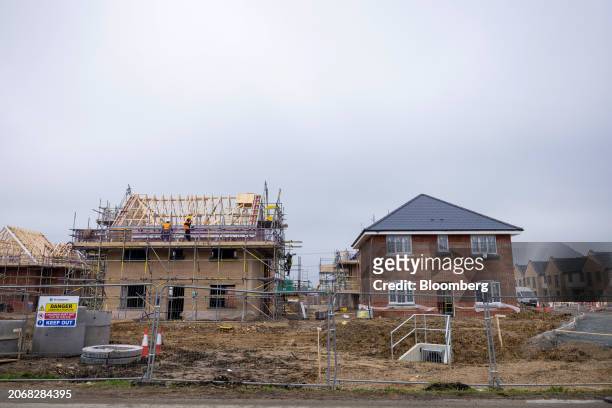 New homes under construction at a Persimmon Plc residential property site in Braintree, UK, on Monday, March 11, 2024. Persimmon are due report their...