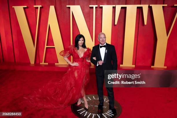 Lauren Sanchez and Jeff Bezos attend 2024 Vanity Fair Oscar After Party Arrivals at Wallis Annenberg Center for the Performing Arts on March 10, 2024...