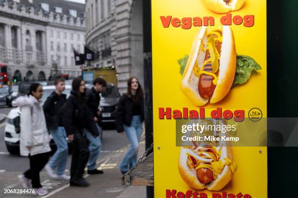 Halal gods and vegan hot dogs for sale at a hot dog stand at Piccadilly Circus on 6th March 2024 in London, United Kingdom.