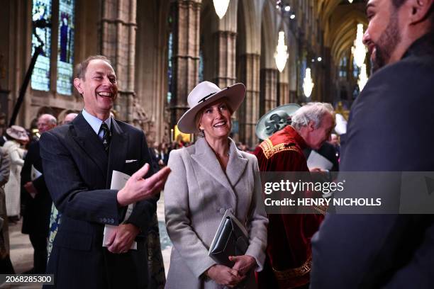 Britain's Prince Edward, Duke of Edinburgh and Britain's Sophie, Duchess of Edinburgh speak with New Zealand singer Benson Wilson as they attend an...