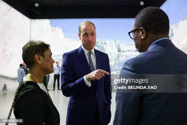 Britain's William, Prince of Wales , speaks with attendees, at an event celebrating The Earthshot Prize Launchpad, in London, on March 11, 2024 ....