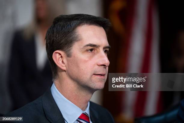 Sen. Tom Cotton, R-Ark., takes his seat for the Senate Select Committee on Intelligence hearing on worldwide threats in the Hart Senate Office...