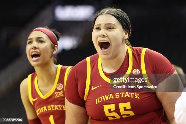 Iowa State Cyclones center Audi Crooks and forward Jalynn Bristow yell from the bench to celebrate a block in the second quarter of a women's Big 12...