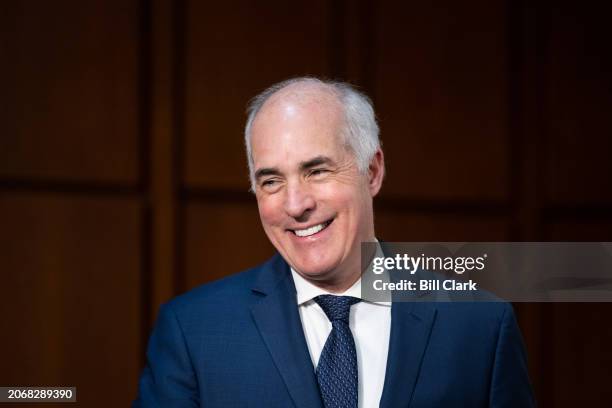 Sen. Bob Casey, Jr., D-Pa., arrives for the Senate Select Committee on Intelligence hearing on worldwide threats in the Hart Senate Office Building...