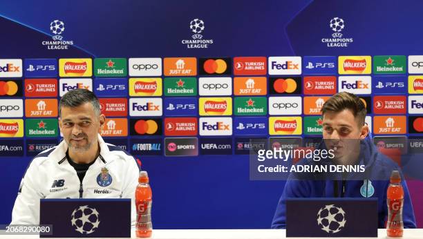 Porto's Portuguese coach Sergio Conceicao and his son, Porto's Portuguese striker Francisco Conceicao attend a press conference on the eve of the...