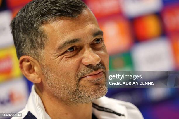 Porto's Portuguese coach Sergio Conceicao attends a press conference on the eve of the UEFA Champions Leauge round of 16 second leg football match...