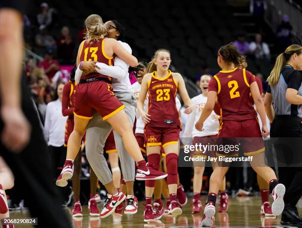 The Iowa State Cyclones celebrate after defeating the Oklahoma Sooners during of the Big 12 Women's Basketball Tournament at T-Mobile Center on March...