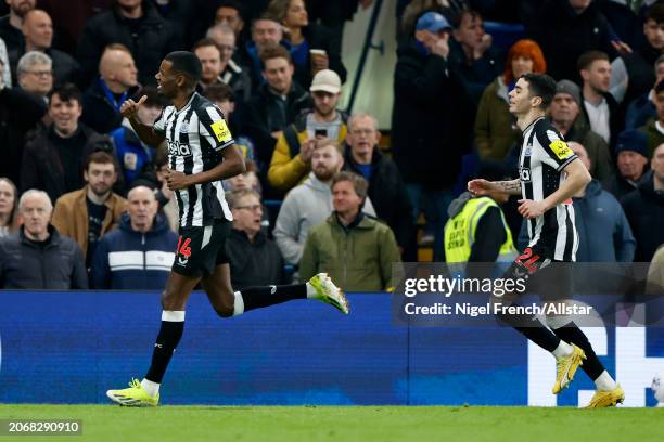 Alexander Isak of Newcastle United and Miguel Almiron of Newcastle United celebrate equalizing goal during the Premier League match between Chelsea...