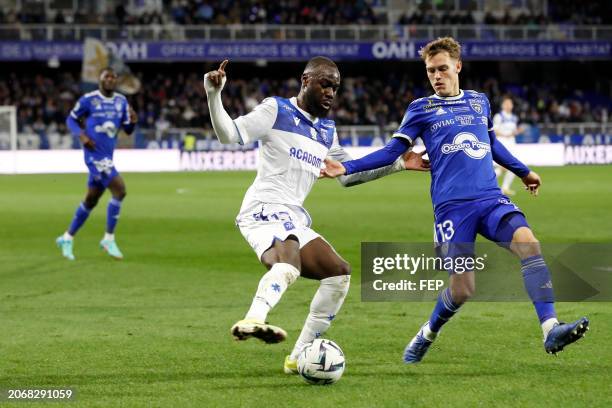 Lassine SINAYOKO - 13 Tom DUCROCQ during the Ligue 2 BKT match between Association de la Jeunesse Auxerroise and Sporting Club Bastiais at Stade de...