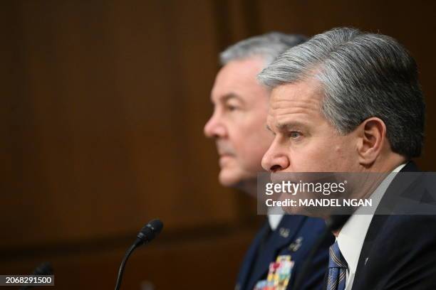 Director Christopher Wray testifies during a Senate Select Committee on Intelligence on the "Annual Worldwide Threats Assessment" in the Hart Senate...