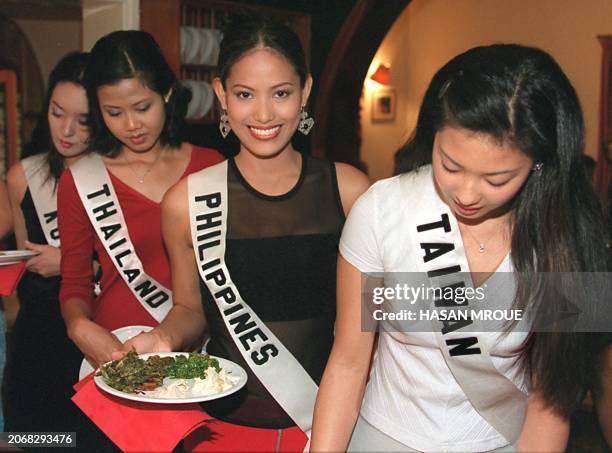 Miss Taiwan 2000, Lei-Ann Chang, and her counterparts from Philippines: Nina Ricci Alagao, Thailand: Kulthida Yenprasert, and Korea: Kim Youn-Joo,...