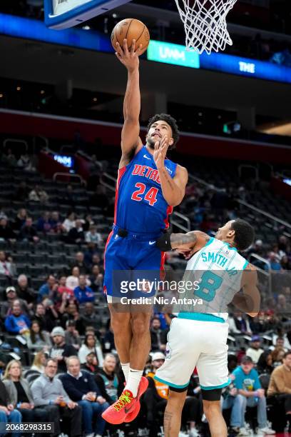Quentin Grimes of the Detroit Pistons shoots the ball against Nick Smith Jr. #8 of the Charlotte Hornets during the second quarter at Little Caesars...