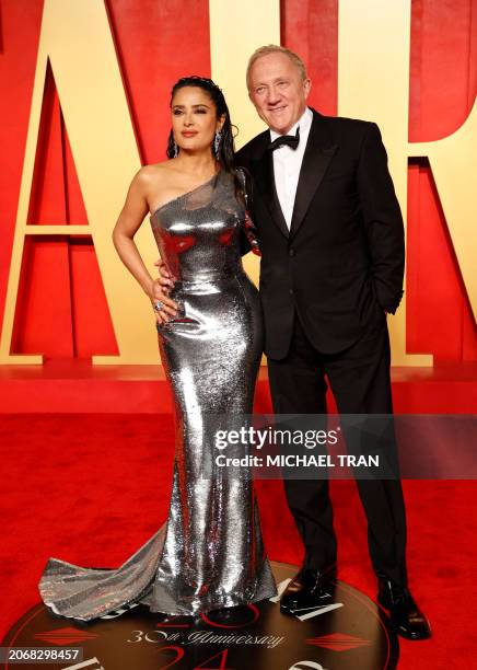 Mexican actress Salma Hayek and husband French businessman François-Henri Pinault attend the Vanity Fair Oscars Party at the Wallis Annenberg Center...