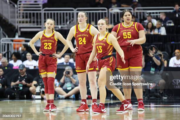 Iowa State Cyclones Kelsey Joens , Addy Brown , Kelsey Joens and Audi Crooks coming out of a timeout during a women's Big 12 tournament semifinal...