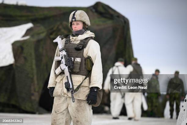 Member of the Swedish Logistics Regiment stands sentry at a supply depot during the Nordic Response military exercise on March 08, 2024 near...