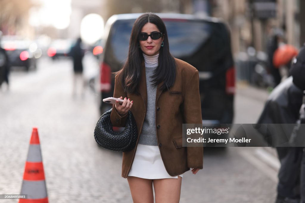 Street Style - Paris Fashion Week - Womenswear Fall/Winter 2024/2025 - Day Five