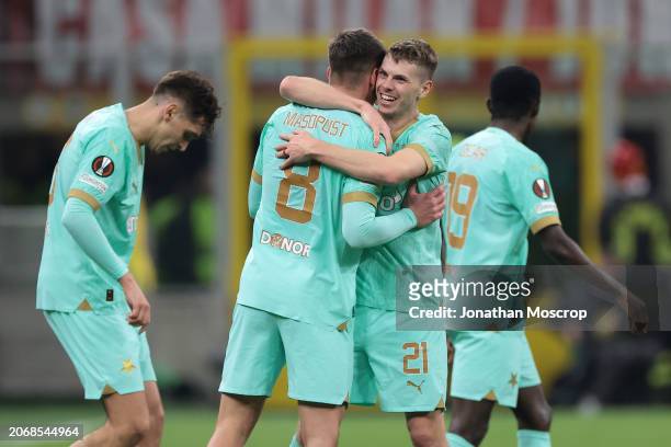 David Doudera of Slavia Praha celebrates with team mates Ondrej Zmrzly, Lukas Masopust and Murphy Dorley after scoring to level the game at 1-1...
