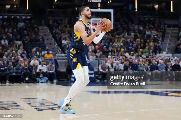 Tyrese Haliburton of the Indiana Pacers attempts a shot in the first quarter against the Minnesota Timberwolves at Gainbridge Fieldhouse on March 07,...