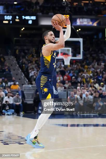 Tyrese Haliburton of the Indiana Pacers attempts a shot in the first quarter against the Minnesota Timberwolves at Gainbridge Fieldhouse on March 07,...