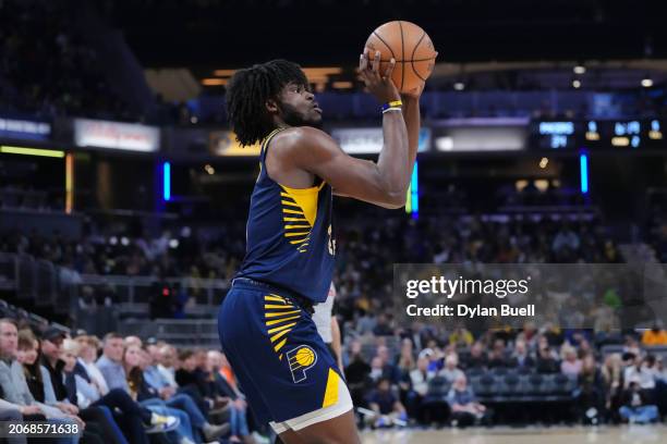 Jarace Walker of the Indiana Pacers attempts a shot in the second quarter against the Minnesota Timberwolves at Gainbridge Fieldhouse on March 07,...