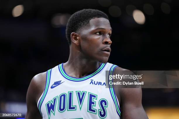 Anthony Edwards of the Minnesota Timberwolves walks across the court in the third quarter against the Indiana Pacers at Gainbridge Fieldhouse on...