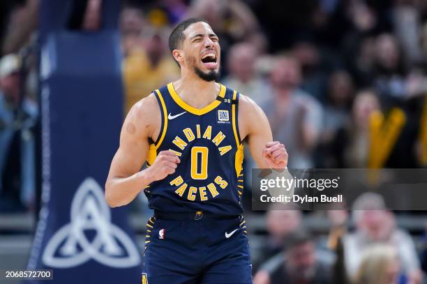 Tyrese Haliburton of the Indiana Pacers reacts in the third quarter against the Minnesota Timberwolves at Gainbridge Fieldhouse on March 07, 2024 in...