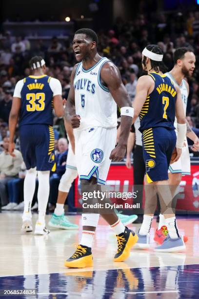 Anthony Edwards of the Minnesota Timberwolves celebrates in the fourth quarter against the Indiana Pacers at Gainbridge Fieldhouse on March 07, 2024...