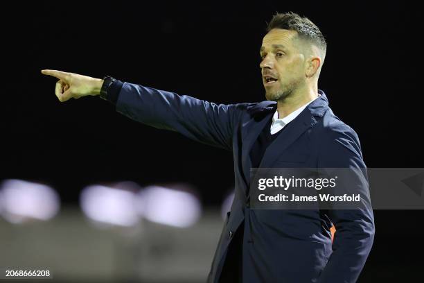 Paul Temple Head Coach of the Phoenix gives out instructions out to his players during the A-League Women round 19 match between Perth Glory and...