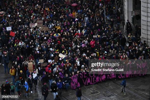 People participate in a protest during International Women's Day on March 8, 2024 in Turin, Italy. Festa della Donna, celebrated in Italy on March...