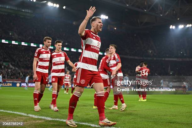 Felix Klaus of Duesseldorf celebrates after scoring his teams first goal during the Second Bundesliga match between Fortuna Düsseldorf and Hamburger...