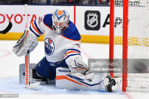 Goaltender Calvin Pickard of the Edmonton Oilers makes a glove save during the first period of a game against the Columbus Blue Jackets at Nationwide...