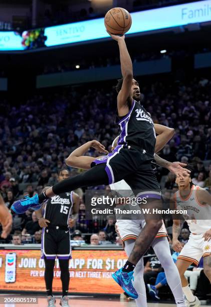 Malik Monk of the Sacramento Kings goes up to shoot and gets fouled against the San Antonio Spurs during the third quarter of an NBA basketball game...