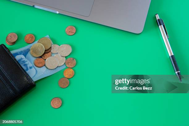 wallet with money on the table - canadian money stock pictures, royalty-free photos & images