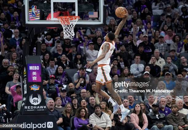 Blake Wesley of the San Antonio Spurs slam dunks against the Sacramento Kings during the fourth quarter of an NBA basketball game at Golden 1 Center...
