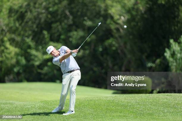 Nick Watney of the United States plays a second shot on the 18th hole during the second round of the Puerto Rico Open at Grand Reserve Golf Club on...