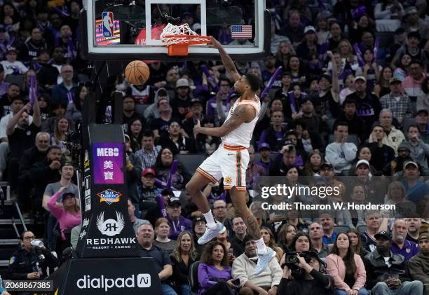 Blake Wesley of the San Antonio Spurs slam dunks against the Sacramento Kings during the fourth quarter of an NBA basketball game at Golden 1 Center...