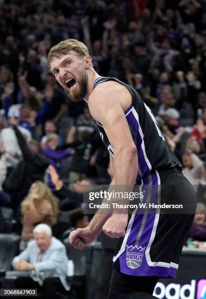 Domantas Sabonis of the Sacramento Kings reacts after a slam dunks giving the Kings the lead against the San Antonio Spurs late in the fourth quarter...