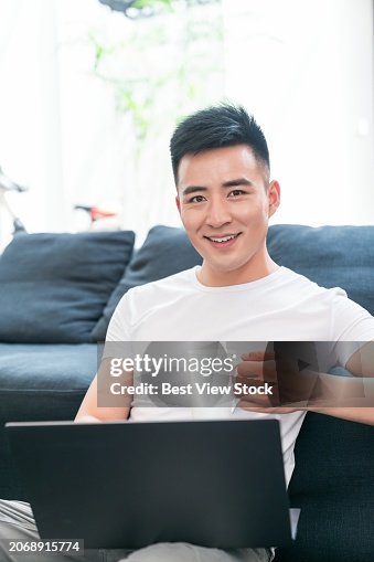 Young Men Who Use A Computer High-Res Stock Photo - Getty Images