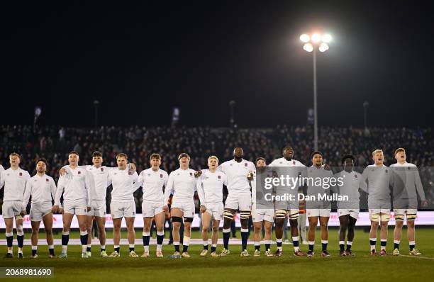 England players line up on pitch, singing their national anthem prior to the U20 Six Nations match between England and Ireland at The Recreation...