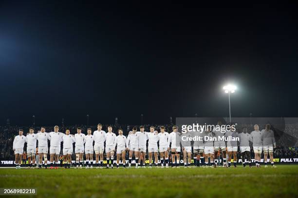 England players line up on pitch prior to the U20 Six Nations match between England and Ireland at The Recreation Ground on March 08, 2024 in Bath,...