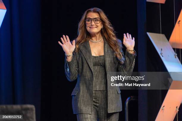 Brooke Shields arrives onstage during the "Keynote: Breaking Barriers, Shaping Narratives: How Women Lead On and Off the Screen" during the SXSW 2024...