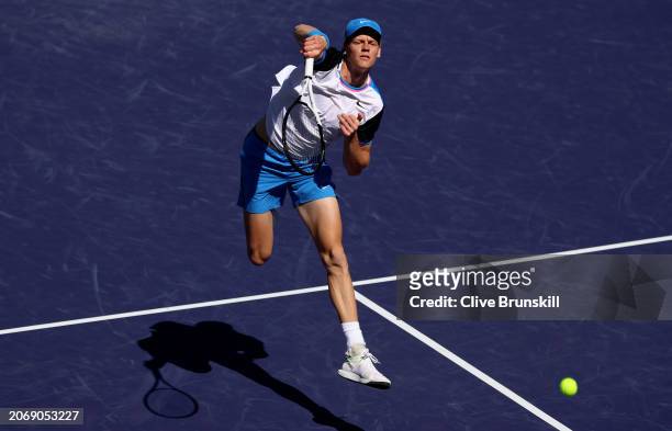 Jannik Sinner of Italy plays a smash against Thanasi Kokkinakis of Australia in their second round match during the BNP Paribas Open at Indian Wells...